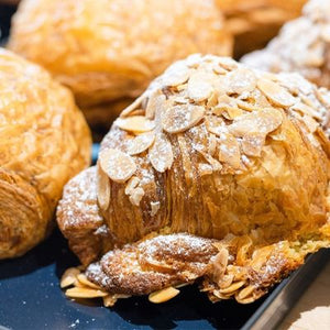 
            
                Load image into Gallery viewer, PQB Almond Crossiant
            
        